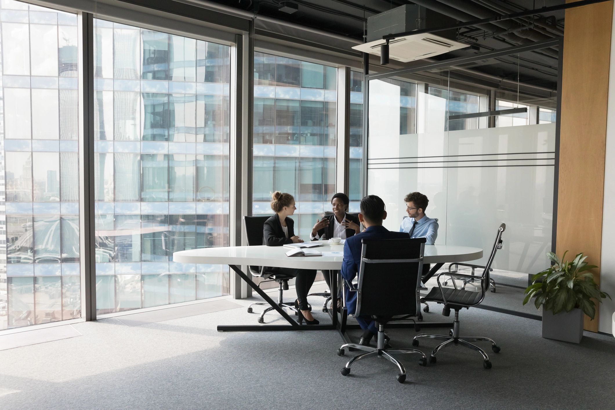 Recruiting team meeting in a modern office